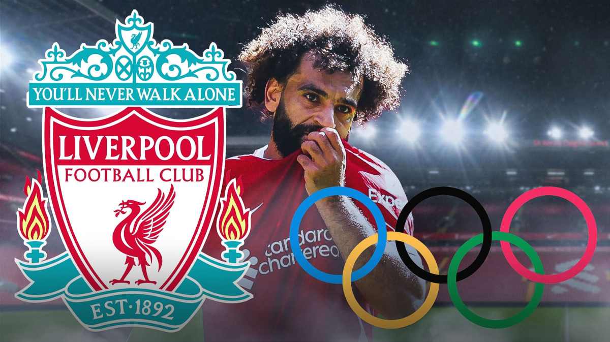 Mohamed Salah in front of the liverpool logo and olympics rings