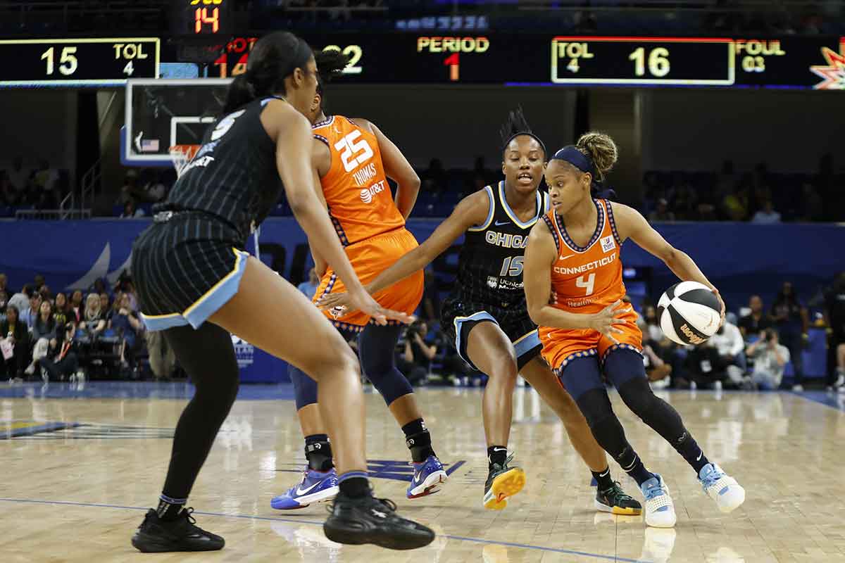 Connecticut Sun guard Moriah Jefferson (4) drives to the basket against the Chicago Sky during the first half of a basketball game.
