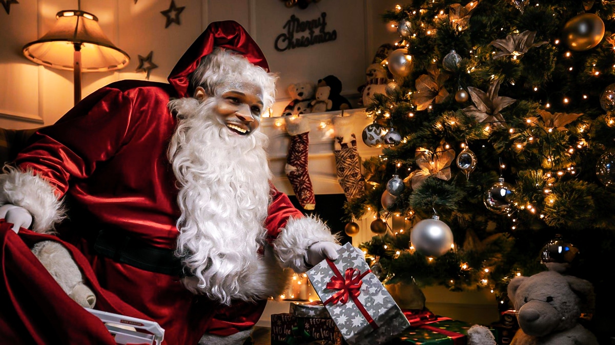 Timberwolves' Anthony Edwards as Santa Claus, with Christmas tree, stockings, candy canes, and gifts all over