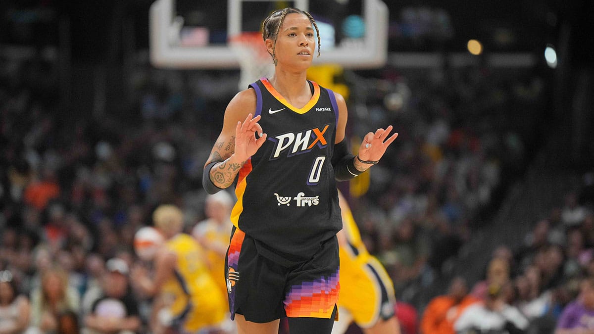Phoenix Mercury guard Natasha Cloud (0) gestures after a three-point basket against the LA Sparks in the second half.