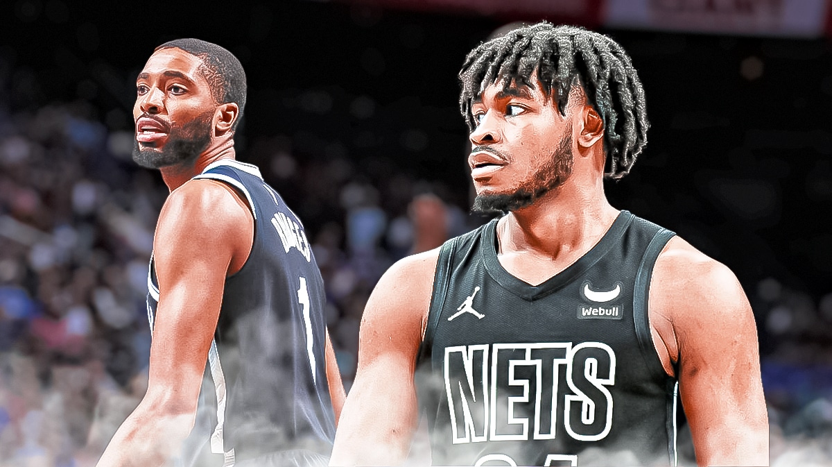 Nets player Cam Thomas looking at Mikal Bridges.