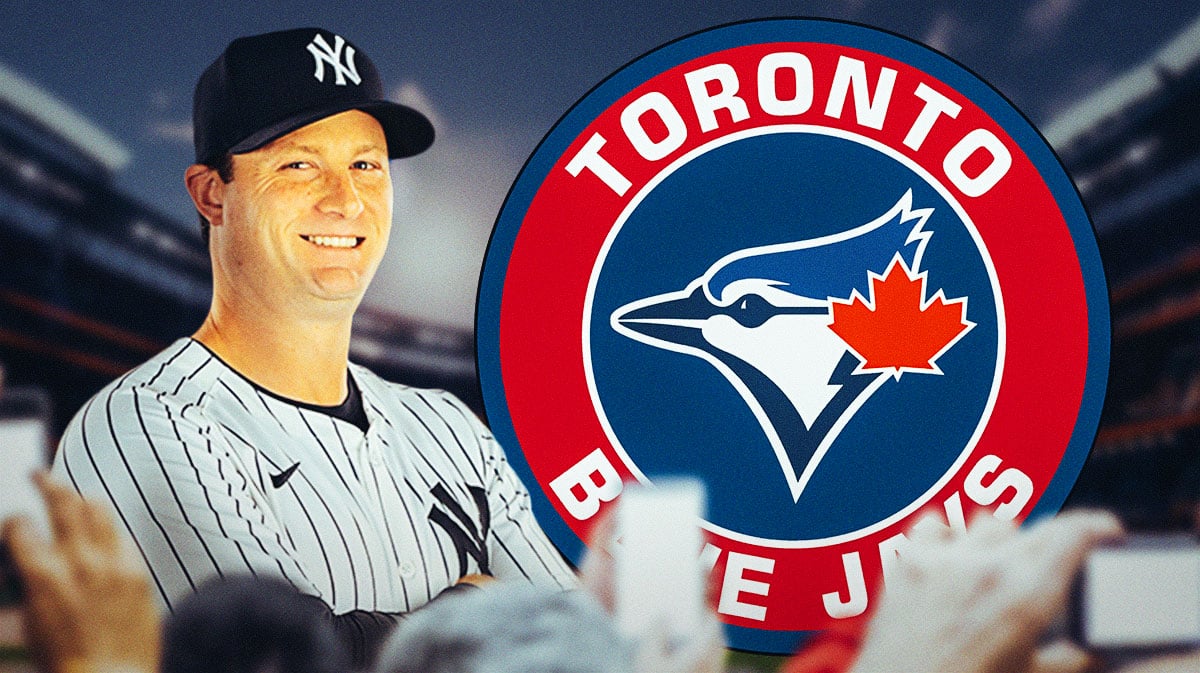 Yankees' Gerrit Cole looking happy, with Blue Jays logo beside him