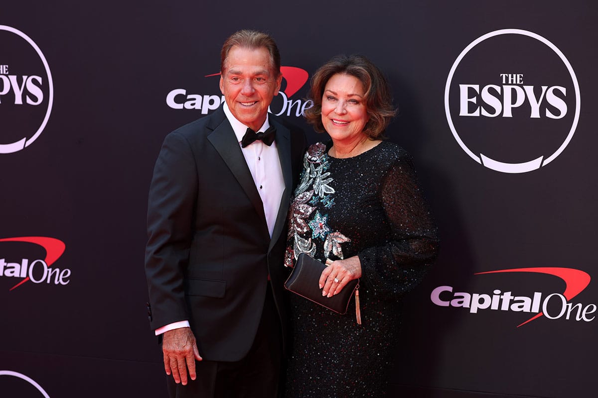  Former Alabama head football coach Nick Saban and his wife Terry Saban arrive on the red carpet before the 2024 ESPYS at Dolby Theatre. 