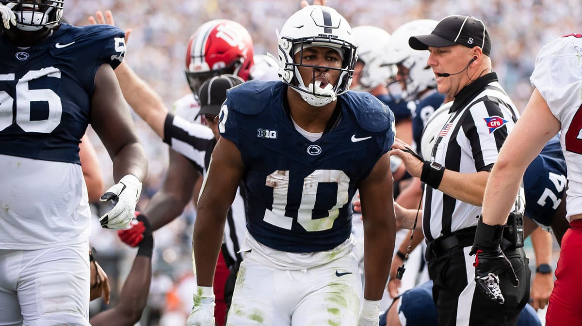 Penn State running back Nick Singleton celebrates after scoring a 2-yard rushing touchdown in the first half of an NCAA football game against Indiana