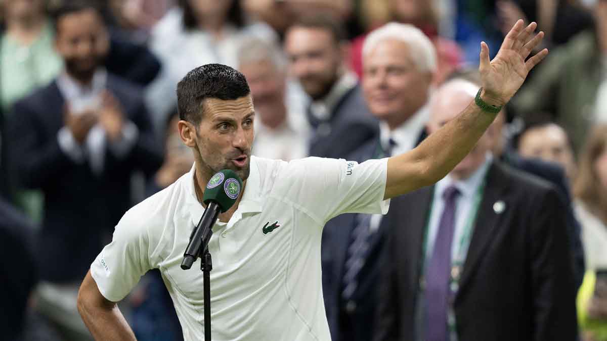 Novak Djokovic of Serbia at his on court interview after winning his match against Holger Rune of Denmark (not shown) on day eight of The Championships at All England Lawn Tennis and Croquet Club. 