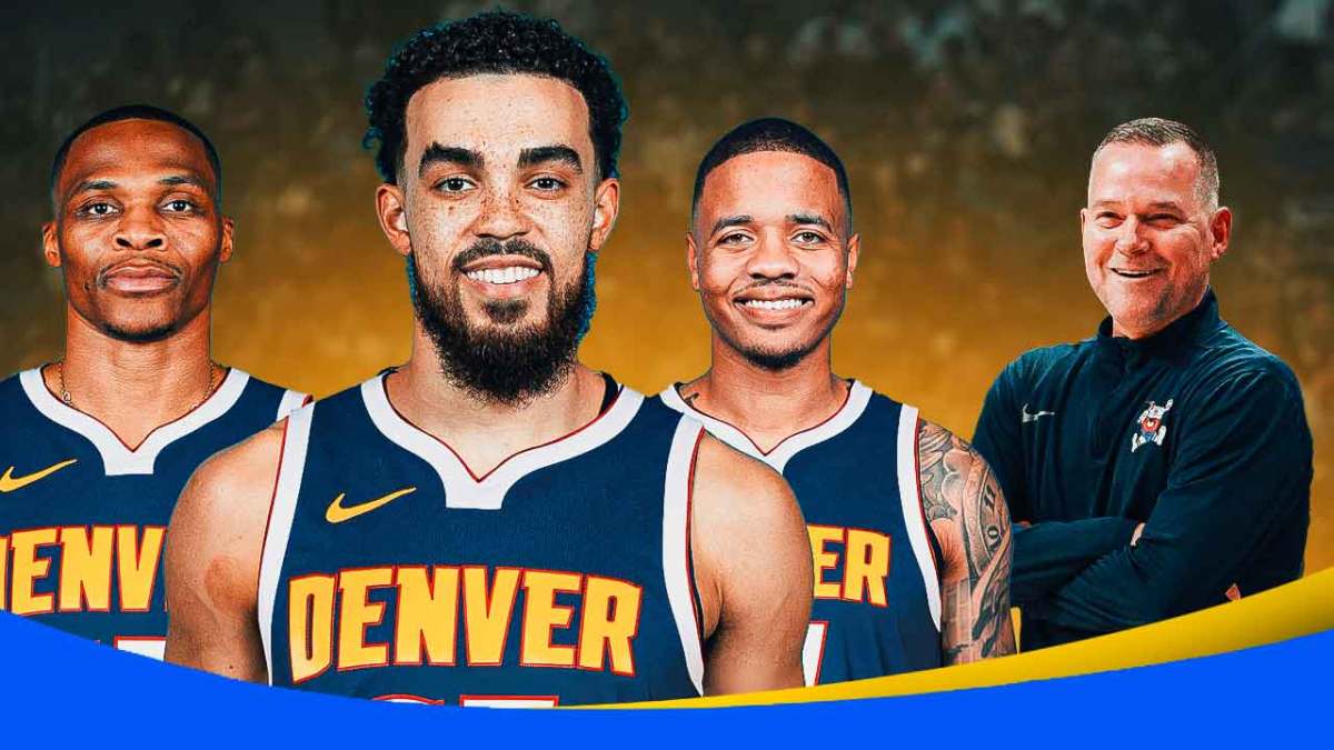 Michael Malone smiling at Russell Westbrook, Tyus Jones, and Markelle Fultz, all in Nuggets uniforms