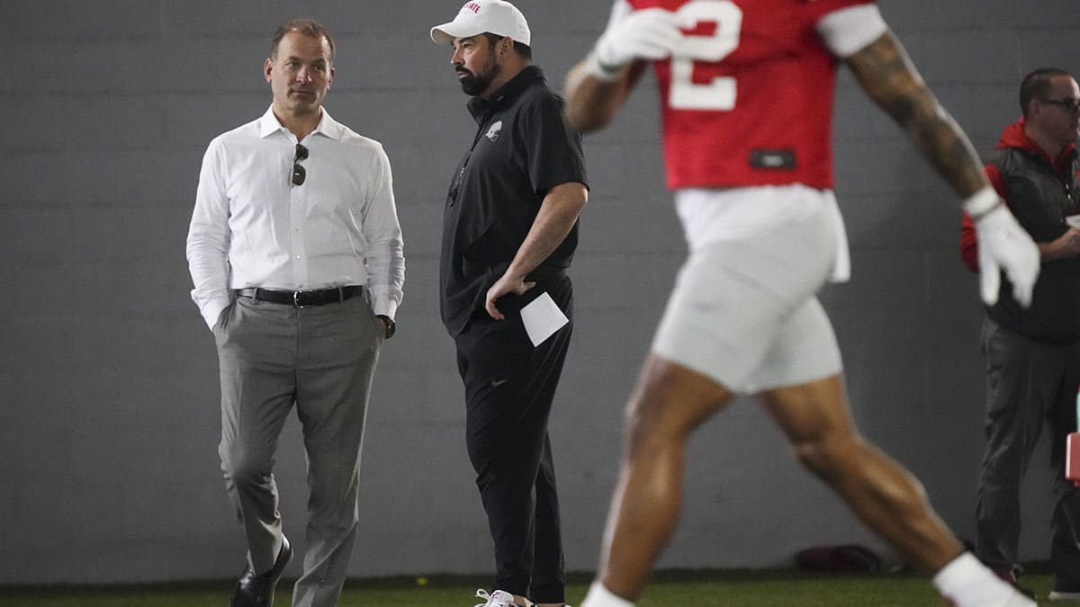 Mar 5, 2024; Columbus, OH, USA; Ohio State Buckeyes head coach Ryan Day talks to incoming athletic director Ross Bjork during the first spring practice at the Woody Hayes Athletic Center.