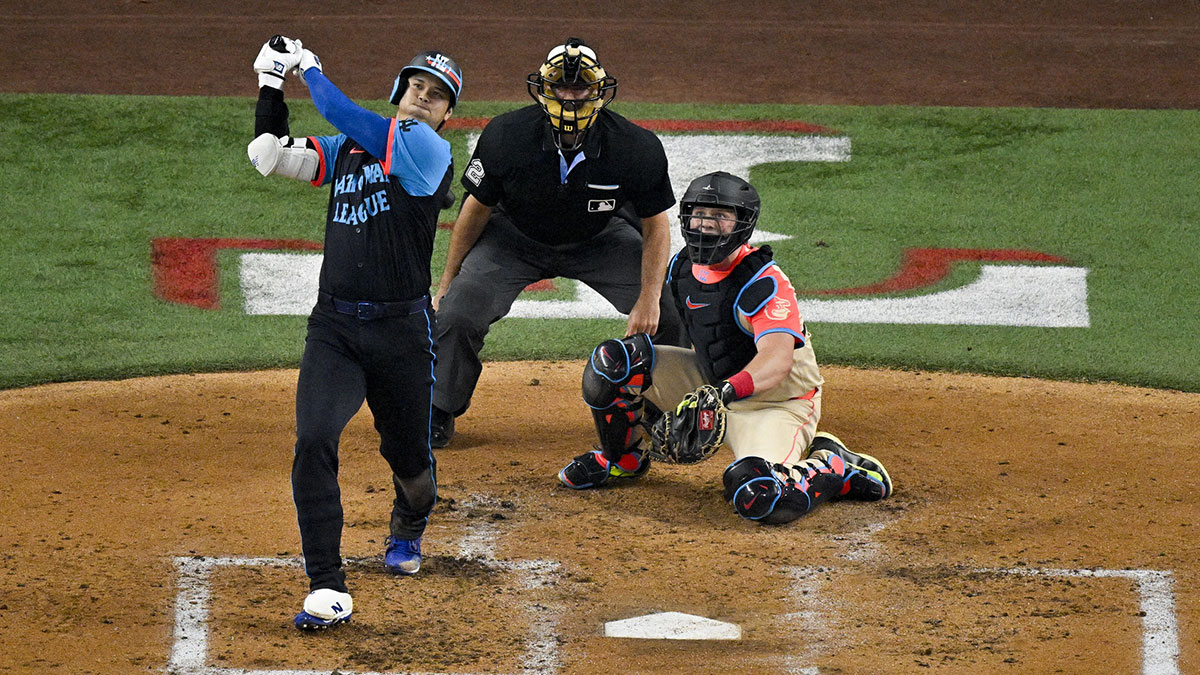 National League designated hitter Shohei Ohtani of the Los Angeles Dodgers (17) hits a three run home run against the American League during the third inning of the 2024 MLB All-Star game at Globe Life Field.