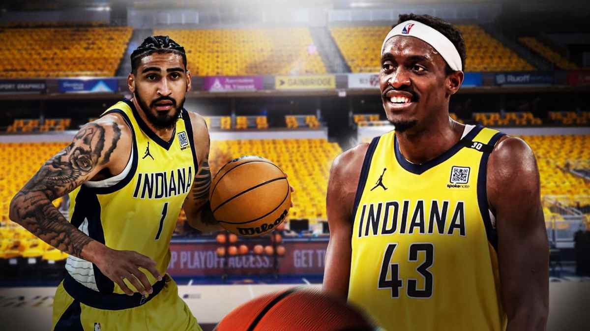 Obi Toppin next to Pascal Siakam in the Pacers arena.