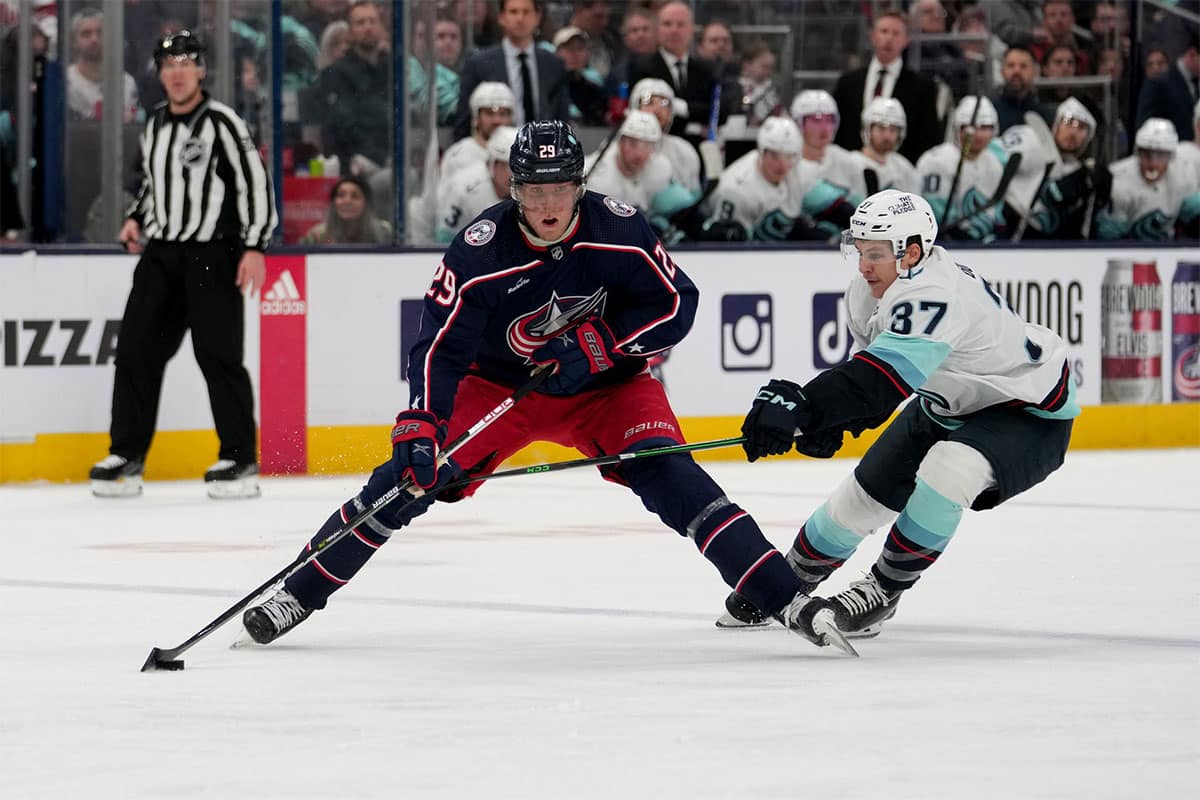 Columbus Blue Jackets left wing Patrik Laine (29) skates against Seattle Kraken center Yanni Gourde (37) during the second period at Nationwide Arena.