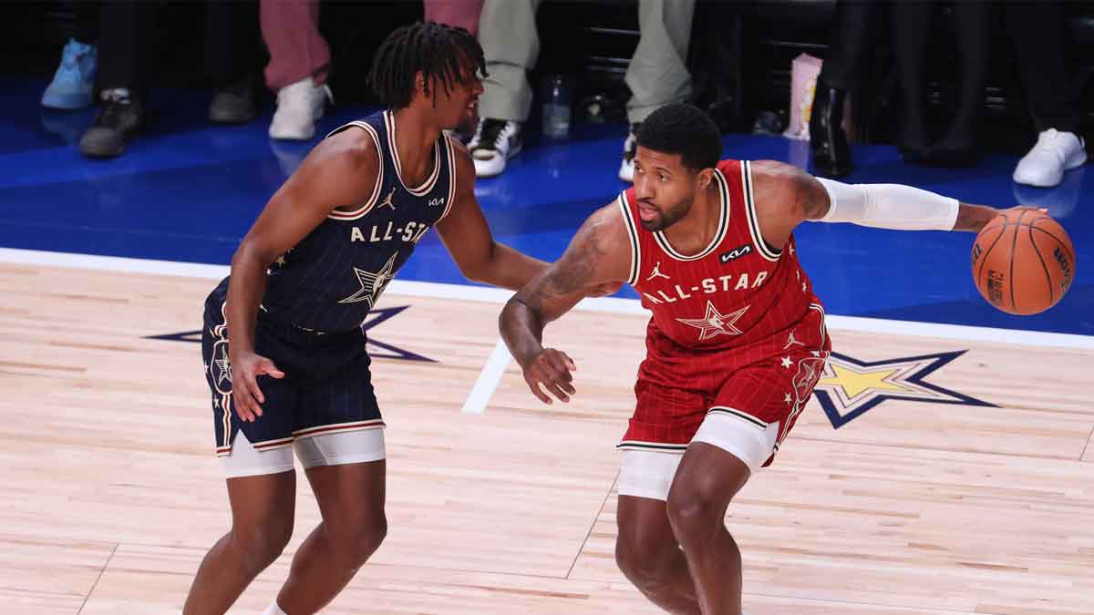 Western Conference forward Paul George (13) of the LA Clippers dribbles the ball against Eastern Conference guard Tyrese Maxey (0) of the Philadelphia 76ers during the second quarter in the 73rd NBA All Star game at Gainbridge Fieldhouse.