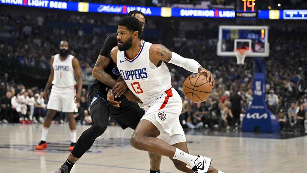 New Sixers forward Paul George (13) drives to the basket against the Dallas Mavericks during the first quarter during game six of the first round for the 2024 NBA playoffs at American Airlines Center.