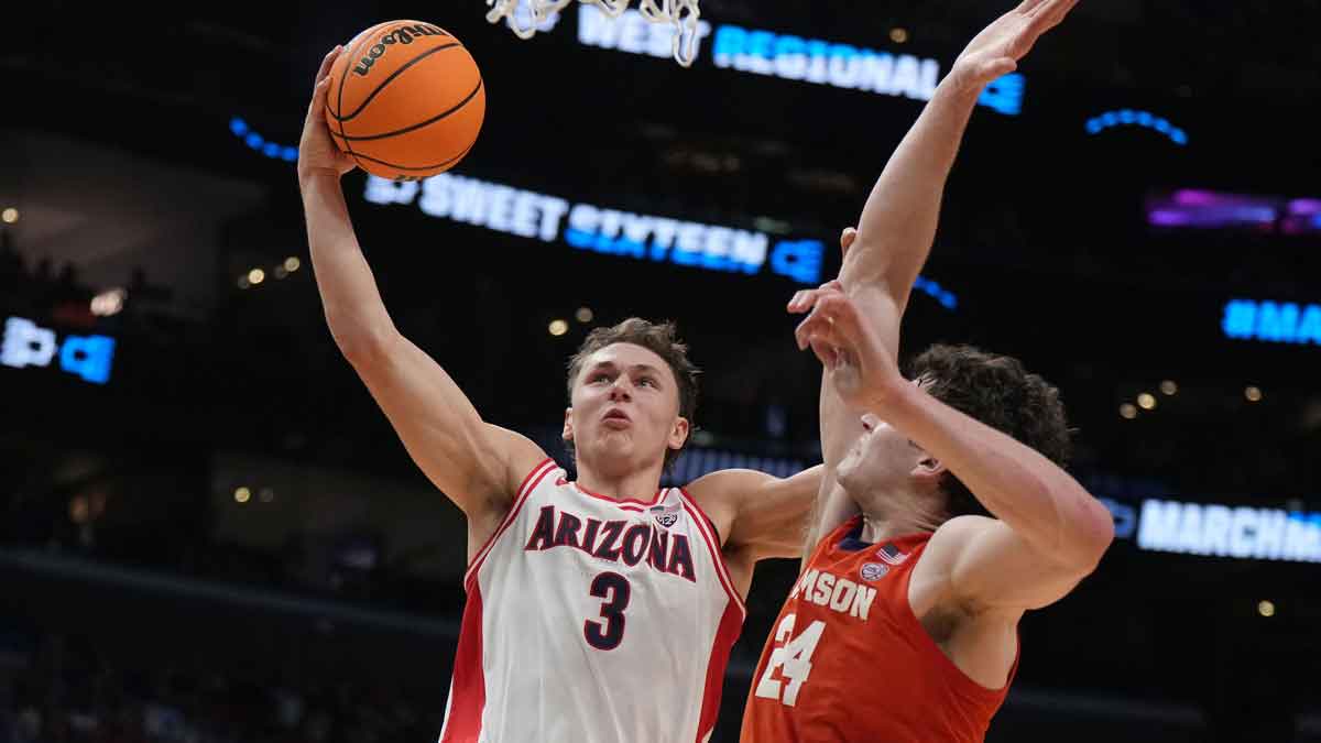 Arizona Wildcats guard Pelle Larsson (3) shoots against Clemson Tigers center PJ Hall (24) in the first half in the semifinals of the West Regional of the 2024 NCAA Tournament at Crypto.com Arena.