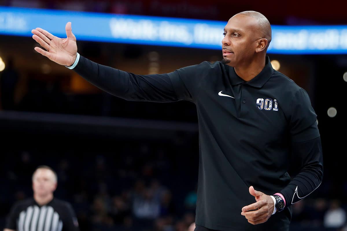 Memphis' head coach Penny Hardaway signals to his players during the game between the University of Charlotte and the University of Memphis at FedExForum