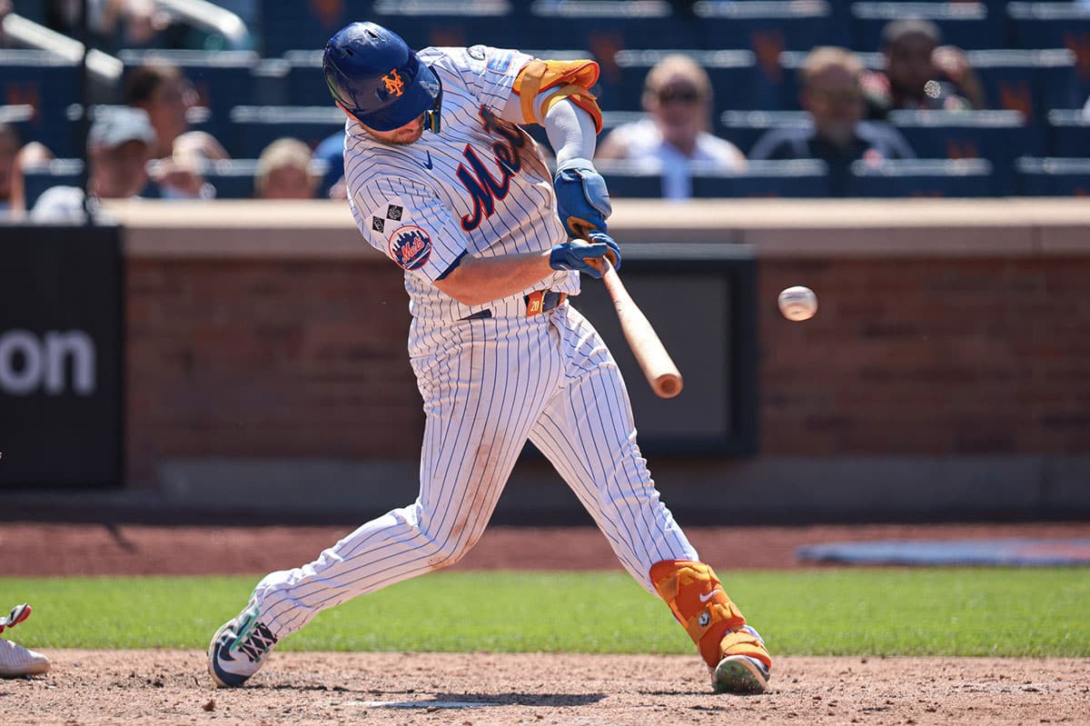 New York Mets first baseman Pete Alonso (20) singles during the eighth inning against the Washington Nationals at Citi Field.