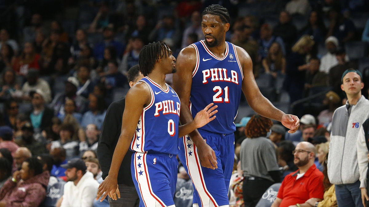 Apr 6, 2024; Memphis, Tennessee, USA; Philadelphia 76ers guard Tyrese Maxey (0) and center Joel Embiid (21) talk as they walk off the court at half time against the Memphis Grizzlies at FedExForum. Mandatory Credit: Petre Thomas-USA TODAY Sports
