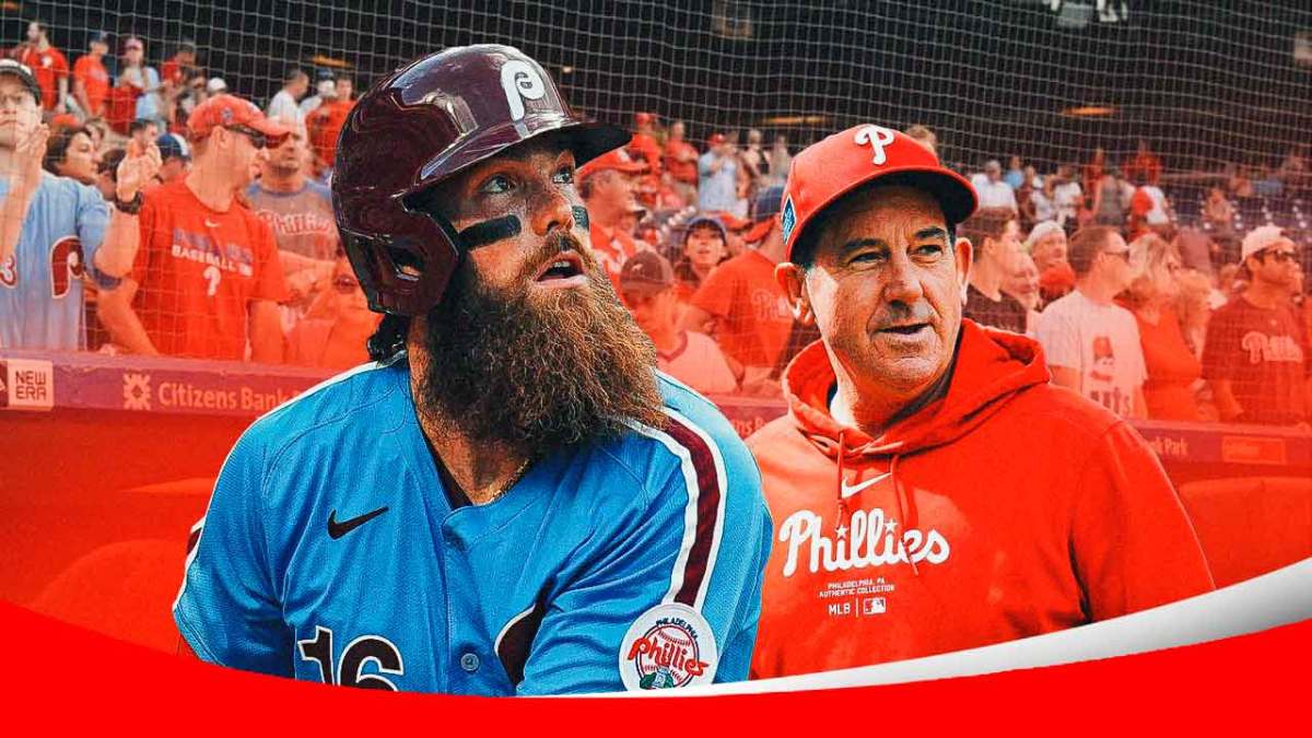 Brandon Marsh (Phillies) and Rob Thompson (Phillies manager) in front of the Phillies dugout