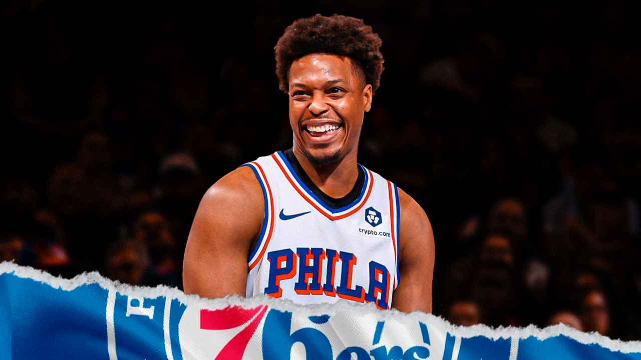 Ex-Heat's Kyle Lowry stands in 76es jersey after free agency contract