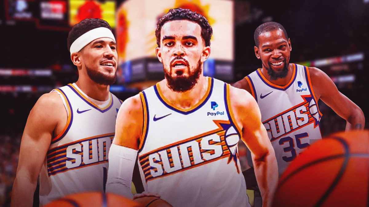 Ex-Wizards', Suns' Tyus Jones next to Kevin Durant, Devin Booker in front of free agency reporters