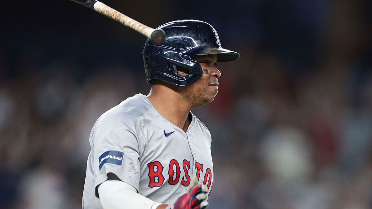 Boston Red Sox third baseman Rafael Devers (11) reacts after his solo home run during the ninth inning against the New York Yankees at Yankee Stadium