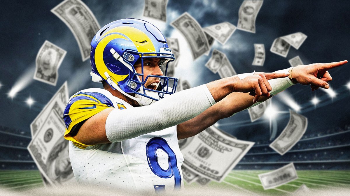 Matthew Stafford looking away with money behind him