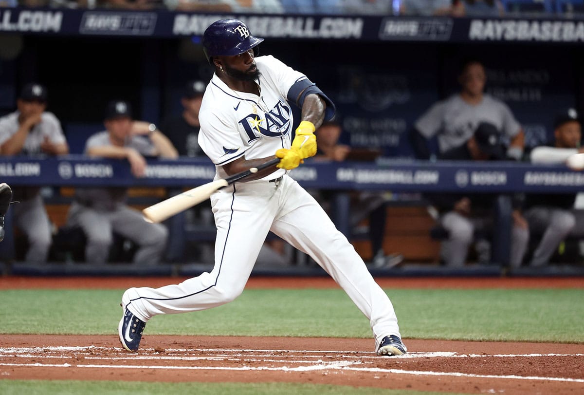 Tampa Bay Rays outfielder Randy Arozarena (56) hits a RBI double against the New York Yankees during the first inning at Tropicana Field.