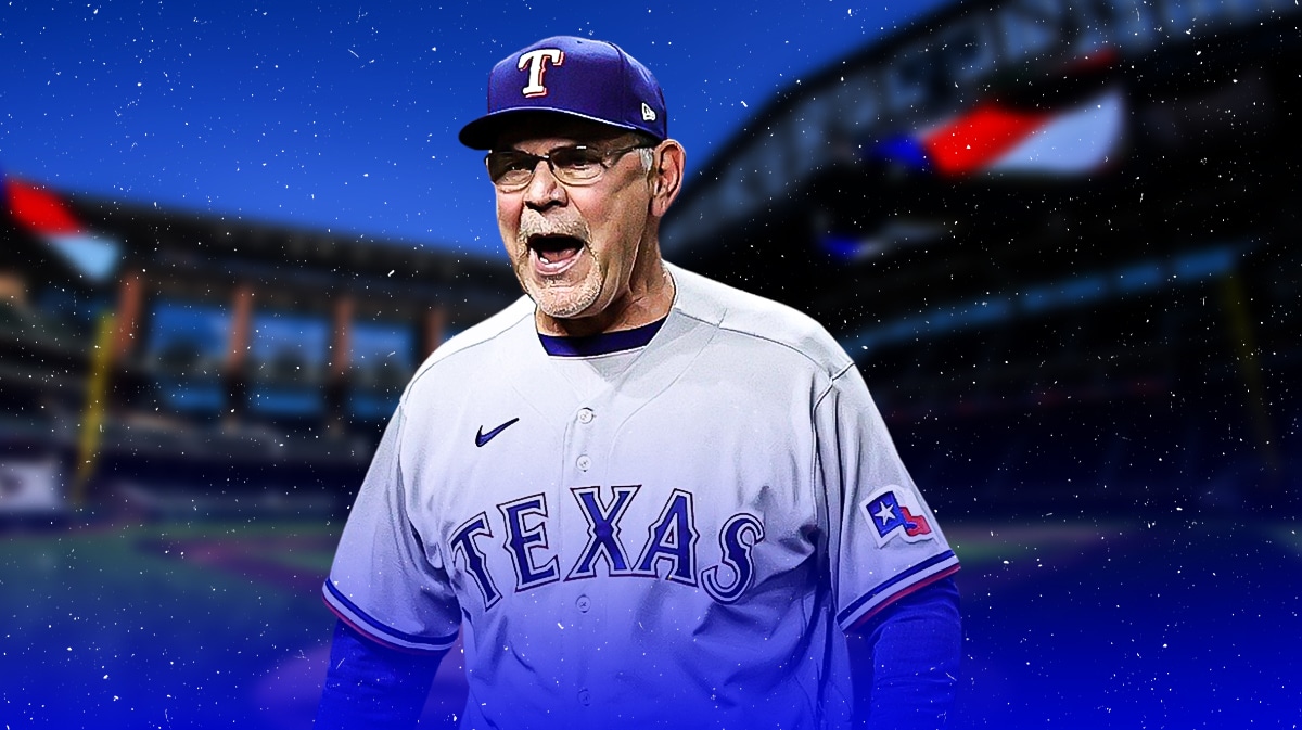Bruce Bochy smiles in Rangers jersey