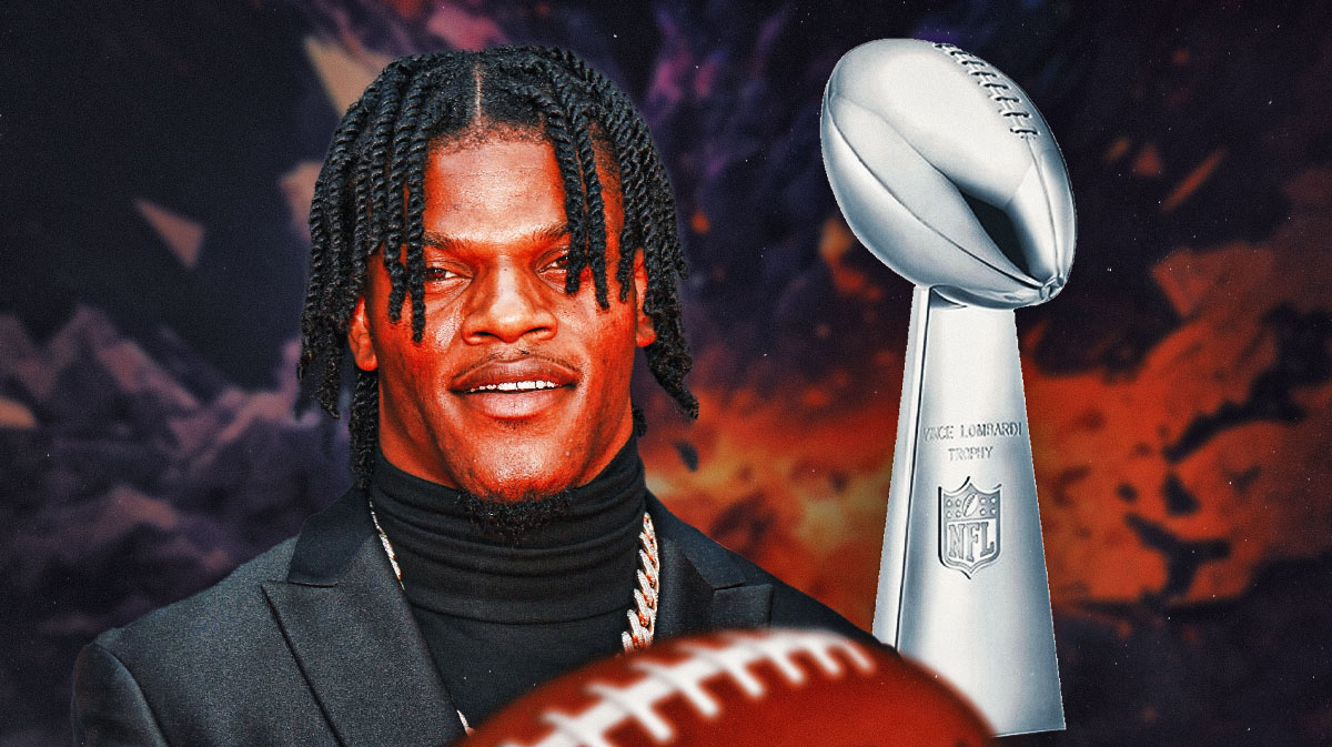 Baltimore Ravens quarterback Lamar Jackson next to the Lombardi Trophy