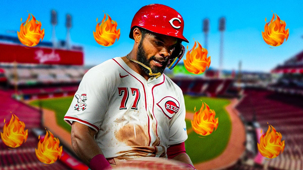 Cincinnati Reds star Rece Hinds in front of Great American Ballpark.