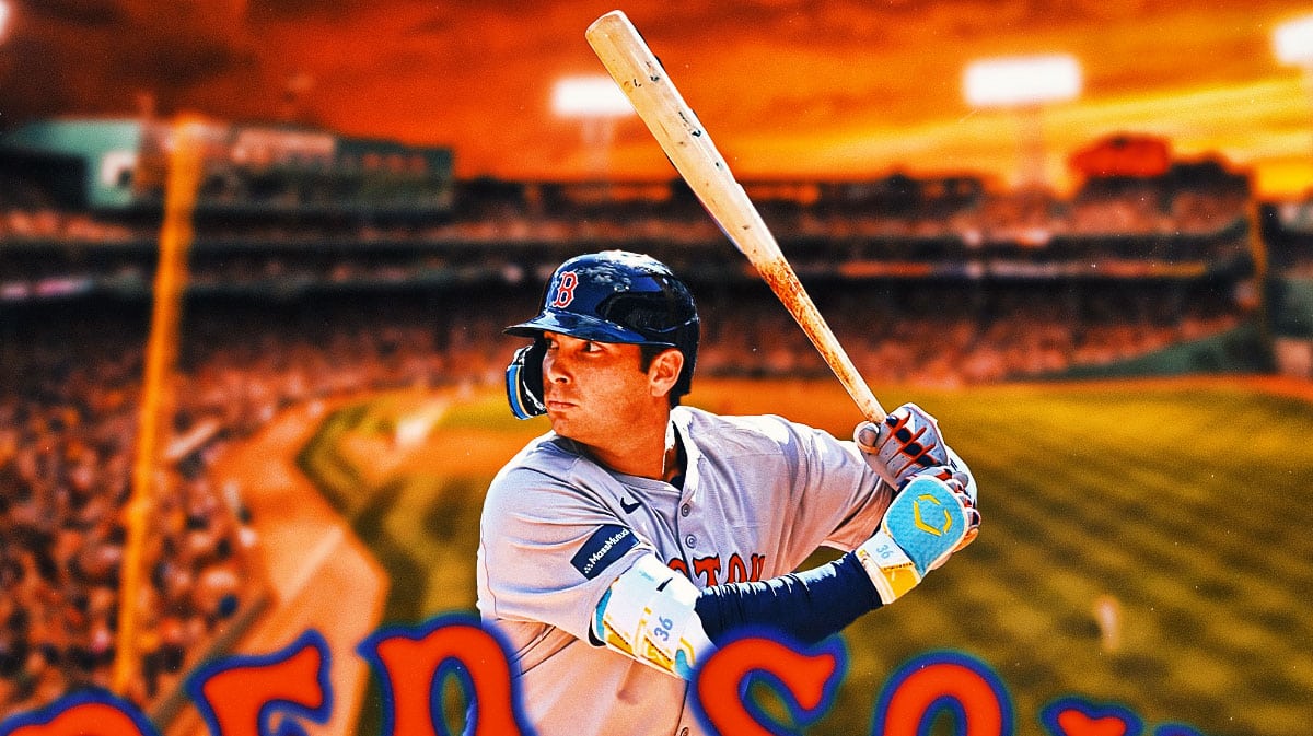 Red Sox Triston Casas swinging a baseball bat at Fenway Park.