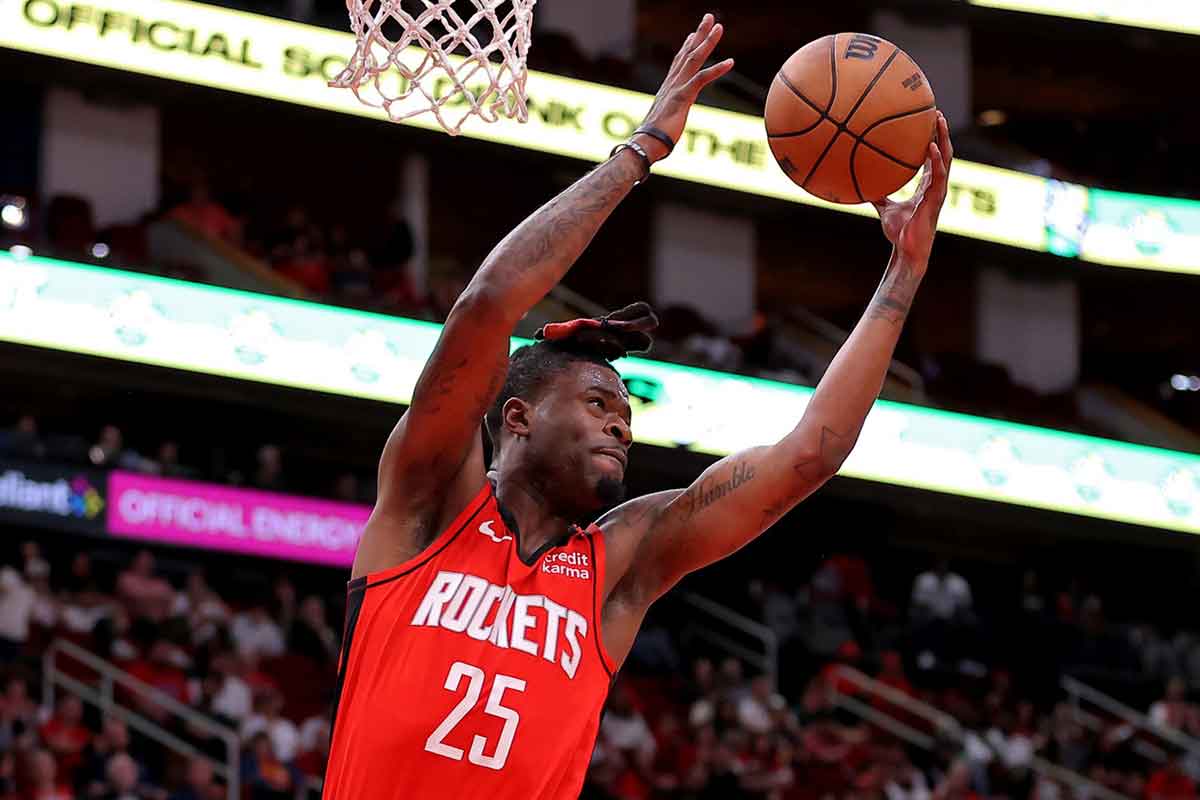 Houston Rockets forward Reggie Bullock Jr. (25) rebounds against the Portland Trail Blazers during the fourth quarter at Toyota Center.