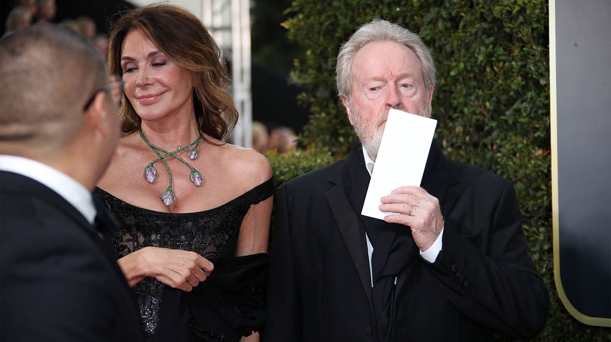 Ridley Scott at the Golden Globes with Giannina Facio in 2018.