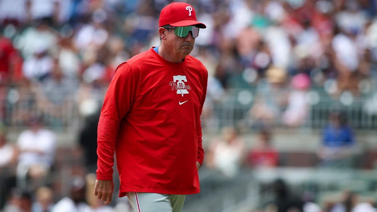 Philadelphia Phillies manager Rob Thomson (59) makes a pitching change against the Atlanta Braves in the second inning at Truist Park.