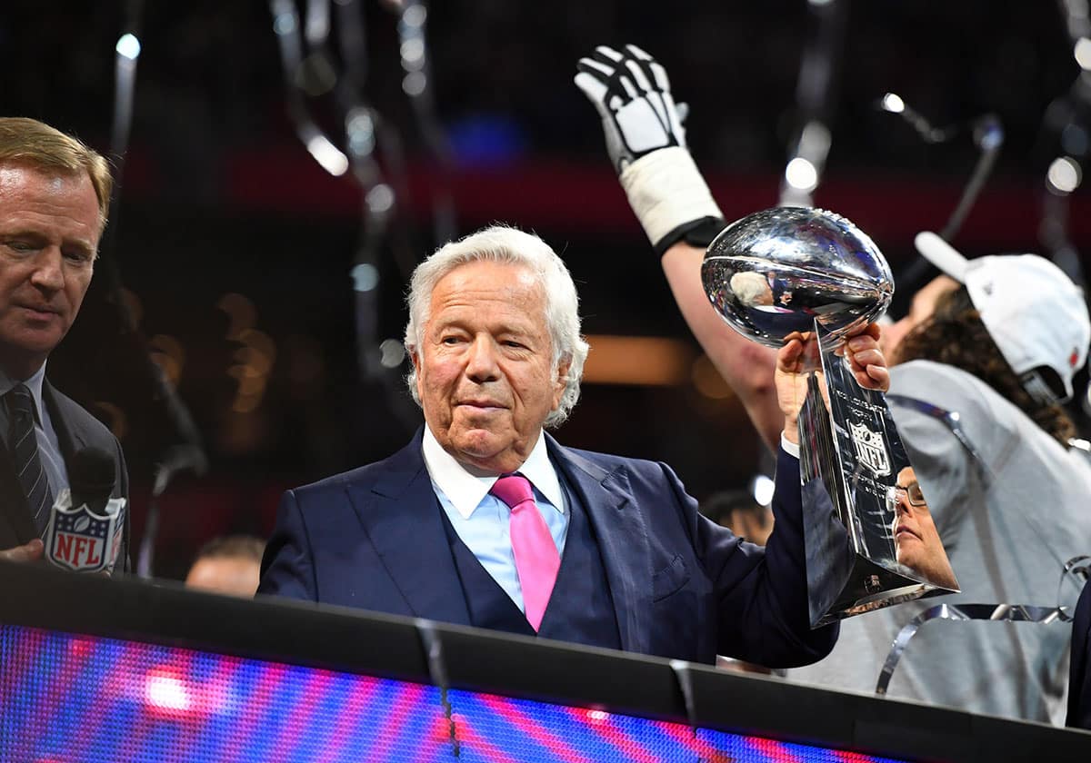 New England Patriots owner Robert Kraft raises the Vince Lombardi Trophy after winning Super Bowl LIII against the Los Angeles Rams at Mercedes-Benz Stadium. 
