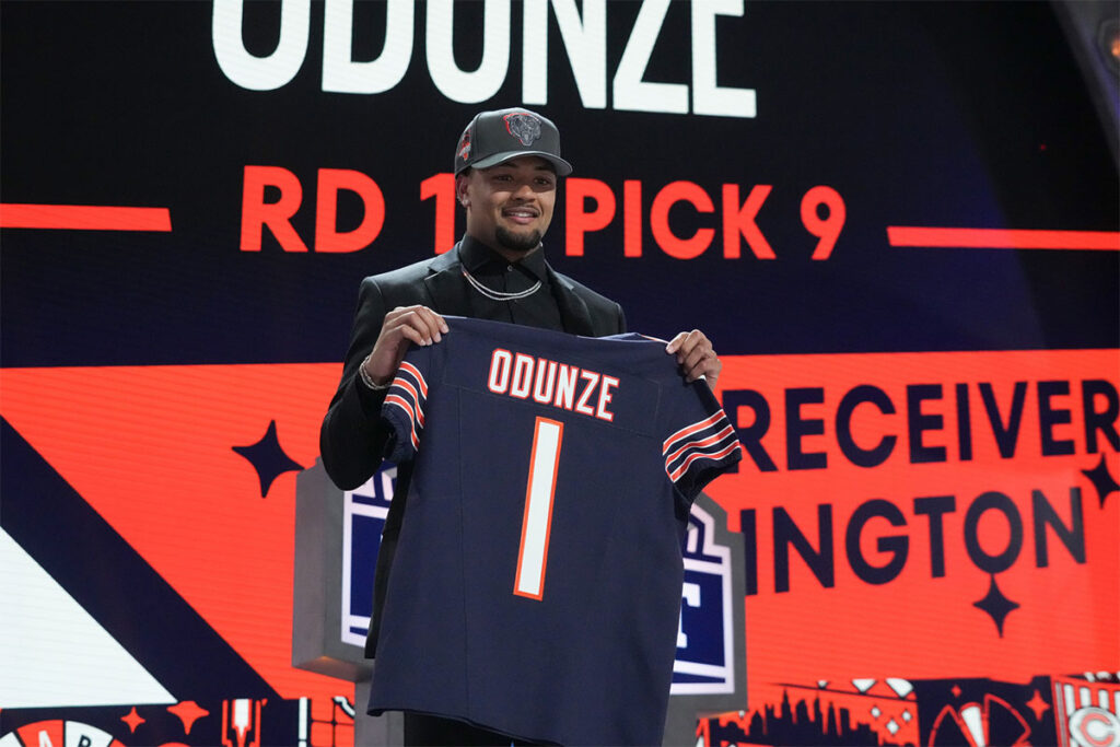 Washington Huskies wide receiver Rome Odunze poses after being selected by the Chicago Bears as the No. 8 pick in the first round of the 2024 NFL Draft at Campus Martius Park and Hart Plaza.