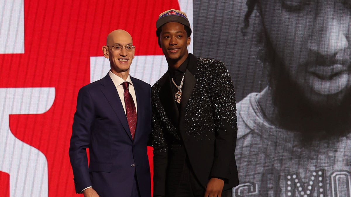 Ron Holland II poses for photos with NBA commissioner Adam Silver after being selected in the first round by the Detroit Pistons in the 2024 NBA Draft at Barclays Center. 