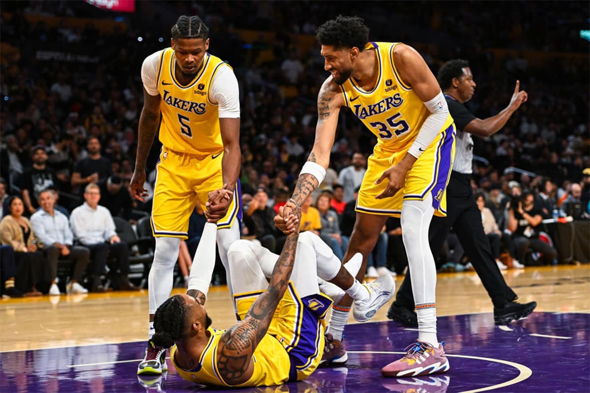 Los Angeles Lakers player Cam Reddish, D'Angelo Russell, and Christian Wood