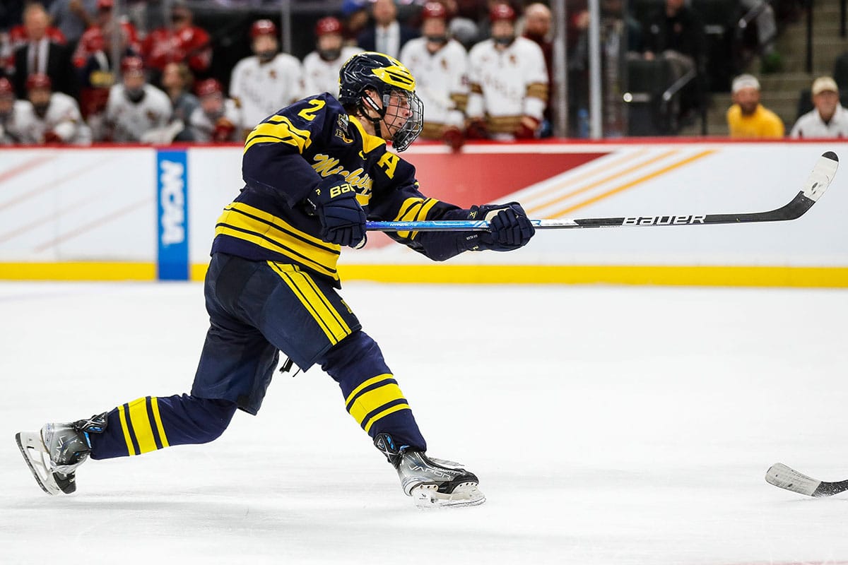Michigan forward Rutger McGroarty (2) shoots the puck against Boston College during the third period of the Frozen Four semifinal game at Xcel Energy Center in St. Paul, Minn.