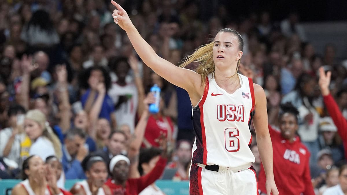 July 29, 2024; Villeneuve-d'Ascq, France; United States guard Sabrina Ionescu (6) celebrates after a three-point basket during the second half against Japan during the Paris 2024 Olympic Summer Games at Stade Pierre-Mauroy. Mandatory Credit: John David Mercer-USA TODAY Sports