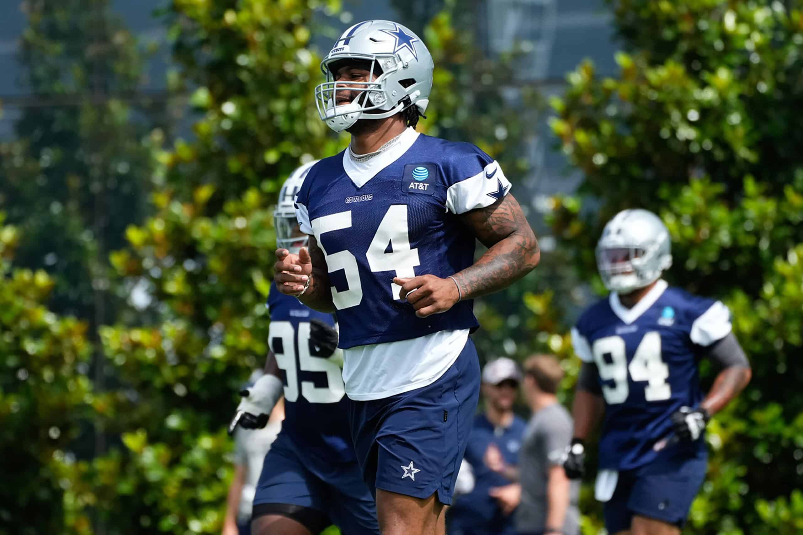 Dallas Cowboys defensive end Sam Williams (54) goes through a drill during practice at the Ford Center at the Star Training Facility in Frisco, Texas.