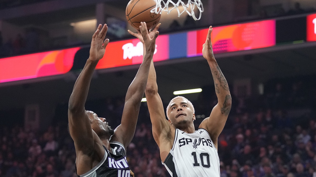 San Antonio Spurs forward Jeremy Sochan (10) shoots the basketball against Sacramento Kings forward Harrison Barnes (40) during the first quarter at Golden 1 Center.