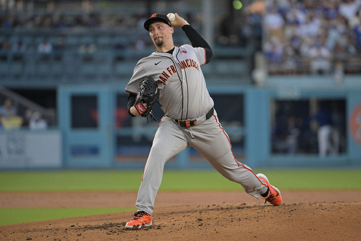 Jul 22, 2024; Los Angeles, California, USA; San Francisco Giants starting pitcher Blake Snell (7) delivers to the plate in the second inning against the Los Angeles Dodgers at Dodger Stadium. Mandatory Credit: Jayne Kamin-Oncea-USA TODAY Sports