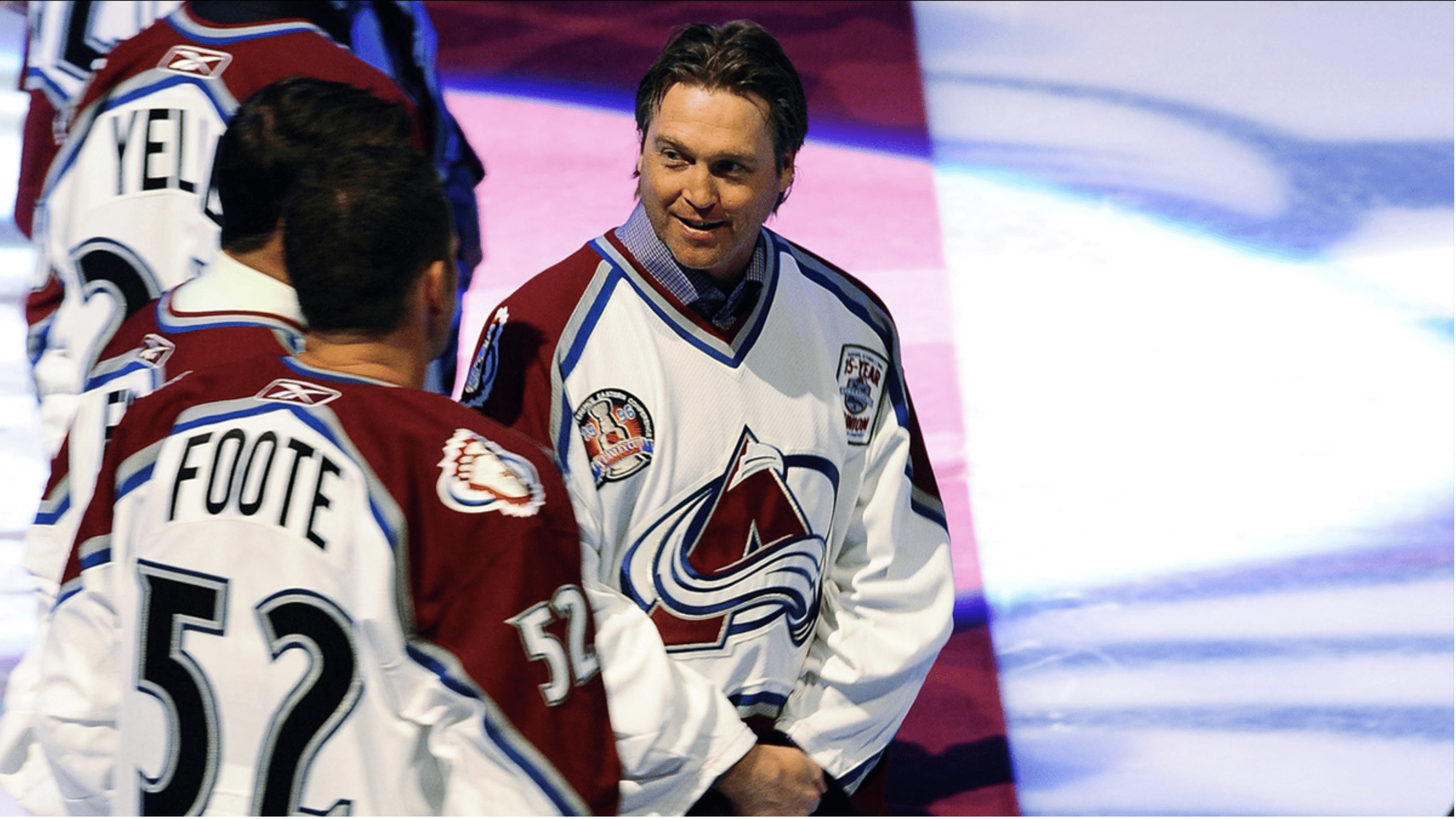 Colorado Avalanche former goalie Patrick Roy (right) and the rest of the 1996 Stanley Cup team are introduced to the fans before the start of the game against the Chicago Blackhawks at the Pepsi Center.