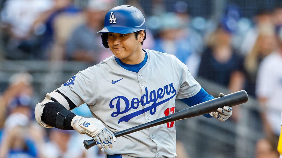Los Angeles Dodgers designated hitter Shohei Ohtani (17) looks into the San Diego Padres dugout before his at bat during the first inning at Petco Park.