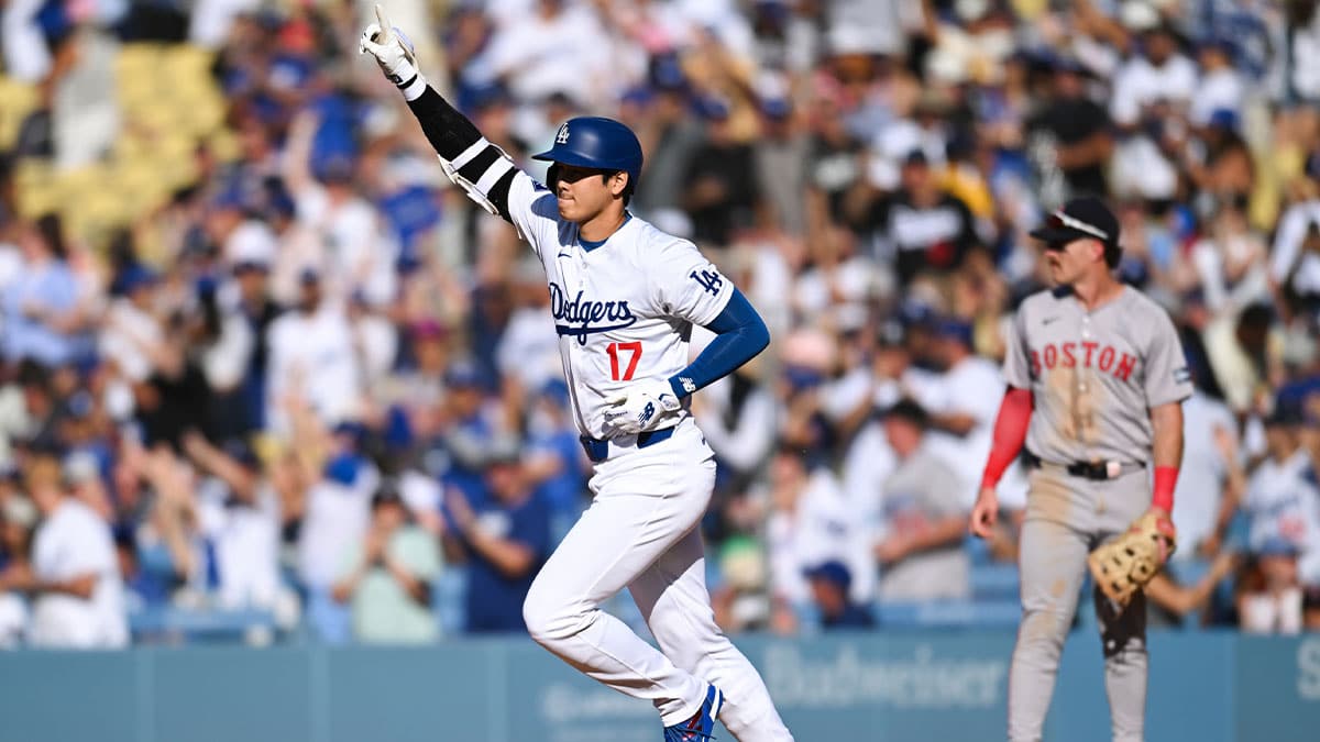 Los Angeles Dodgers designated hitter Shohei Ohtani (17) celebrates after hitting a solo home run against the Boston Red Sox during the fifth inning at Dodger Stadium. 