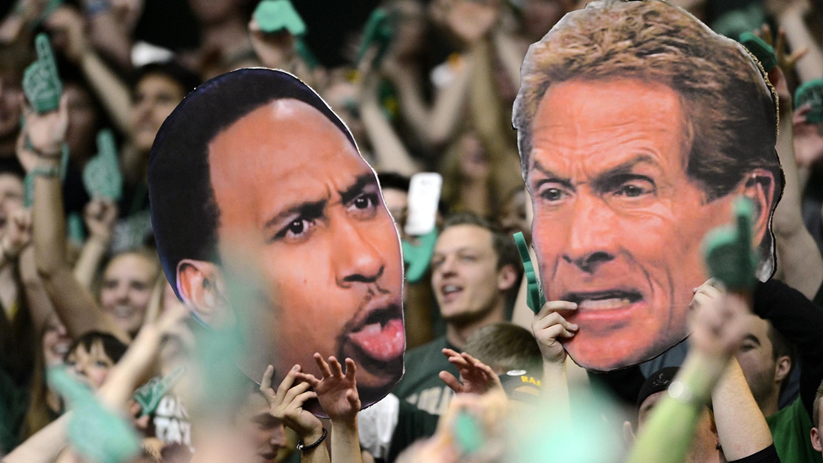 Colorado State Rams fans hold large cut outs of ESPN television personality Stephen A. Smith (left) and Skip Bayless (right) during the game against the New Mexico Lobos at Moby Arena. The Lobos defeated the Rams 91-82.