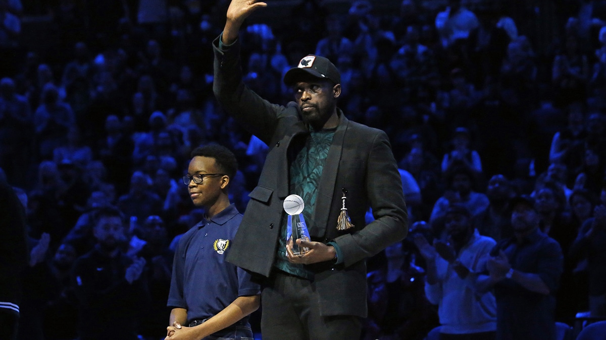Former NBA player Luol Deng receives the Sports Legacy Award prior to the game between the Phoenix Suns and the Memphis Grizzlies at FedExForum. 