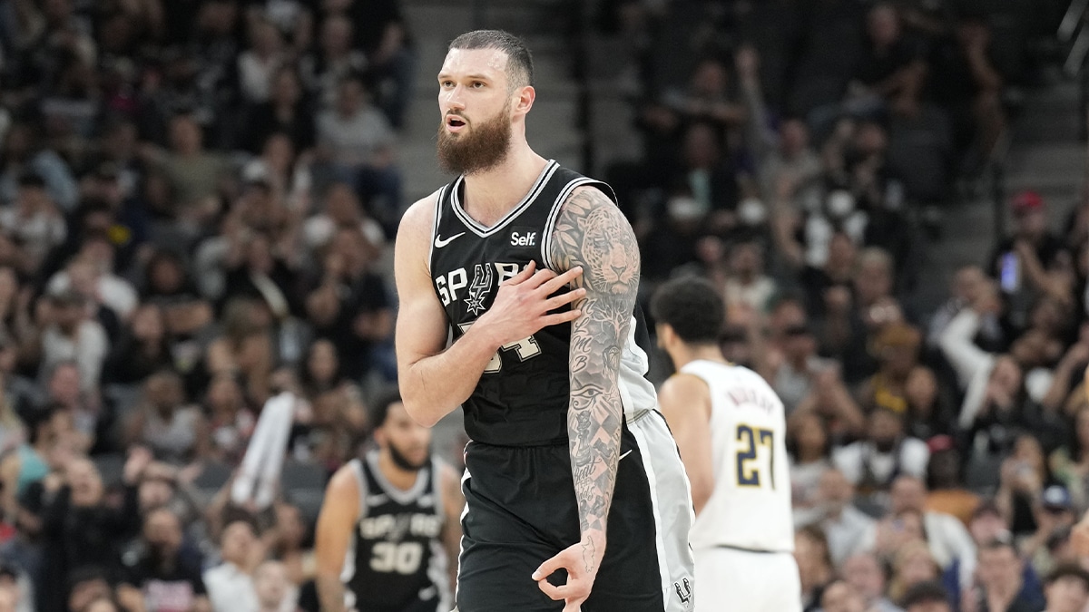 San Antonio Spurs forward Sandro Mamukelashvili (54) reacts after scoring a three-point basket during the second half against the Denver Nuggets at Frost Bank Center.