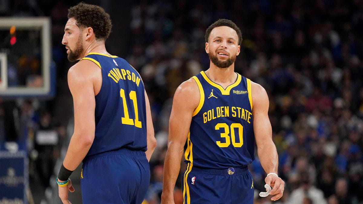 Golden State Warriors guard Stephen Curry (30) stands next to guard Klay Thompson (11) after a play against the Miami Heat in the third quarter at the Chase Center.