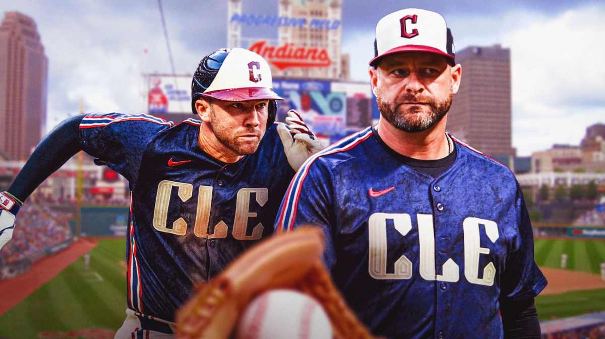 Stephen Vogt (Guardians manager) and David Fry (Guardians) with Progressive Field (Cleveland) in the background